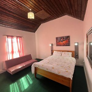 Kamer met een Queen Size Bed